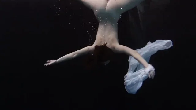 Porn videos: Girl floa in pool in front of brother